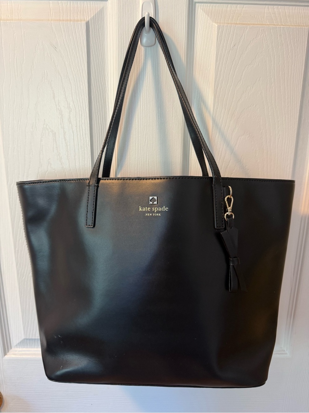 kate spade Black Leather Tote with Tassel Charm